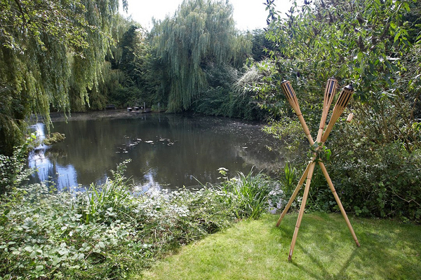 The Whitecroft Pond
A "Monet Day" (okay, the swans killed all of the water lillies) at Whitecroft, overlooking our private quarter-acre pond at the top of the garden.
Keywords: Monet pond water lillies luau torches sunshine willows