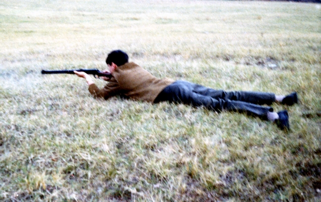 Sharpshooter Craig - Thanksgiving 1966
My uncle Dinny had a .22 rifle that he could barely use.  When we went for our mandatory outdoor walk on Thansgiving, he brought his rife --- and asked me to have a go.  What he didn't know is that I'd had three years of ROTC in high school, and was a reasonably accomplished marksman.  I don't think I've handled a rifle since this photograph was taken 42 years ago.
Słowa kluczowe: Craig Walsh Marksman Prone position Rifle ROTC Shoot