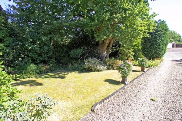 Garden Adjacent to Gravel Track
This garden, cultivated by our neighbours with our revocable consent, is technically on our property.  We are considering incorporating this garden into our own.
Keywords: Whitecroft garden track