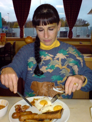 Marjorie With a Little Chef Breakfast
At a motorway stop on the M1, heading north to York.  Marjorie tucking in to her full English breakfast.
Trefwoorden: Marjorie Little Chef motorway stop full English breakfast eggs