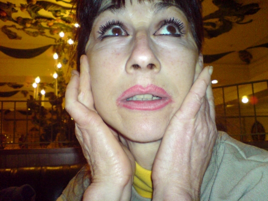 Marjorie Giving Herself a Face Lift
At a coffee shop in Harrods in London, up a small set of stairs above the produce section.  You sit essentially at roof level.
Klíčová slova: Marjorie face lift Harrods coffee shop London