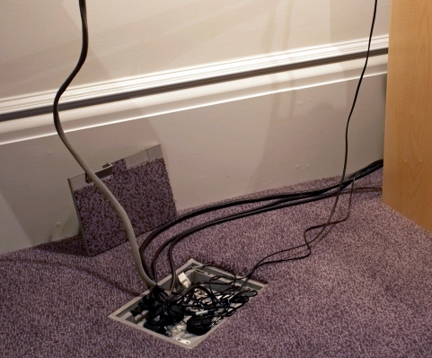Wire Management - Andaz Liverpool Street Hotel
There were no plug sockets (power points) near the desk in our suite in the Andaz Liverpool Street Hotel.  To plug in my laptop and cell phone I lifted the top on this little box, to the left of the desk, and found this tangle of wires.  I had to use my laptop elsewhere in the room.
Keywords: Accommodation Accomodation Andaz Cable Computer Five Star Hotel Hotels Hyatt Liverpool Street Luxurious Luxury Plug Power point Top Class Wires