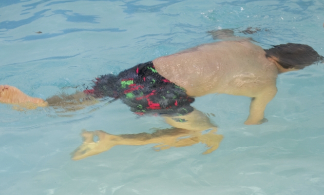 I know it's in here somewhere
Peter, the sound man with the RDF crew, filming the documentary "Impress Me", looking for broken glass from one of the lights above the pool
Keywords: Crew Peter Pool RDF Sound Swim Swimming Television TV