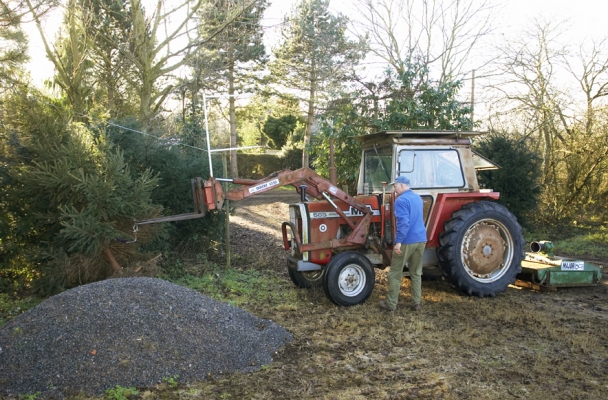 Getting our live Christmas tree
The Whitecroft "tradition" of having a live, rooted tree took us to the southern part of Gloucestershire, near the Severn, where this tree farmer dug up a gorgeous Norfolk pine for us.  He needed his tractor to load it in our rental truck.
Keywords: Christmas Tree Christmas Trees Plantation Plantations Tractor Tree Trees