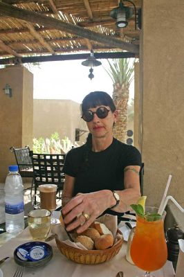 Lunch at Bab al Shams
It's great to eat outdoors -- something we don't do that often in England.  Marjorie enjoying lunch on our first day at Bab al Shams, in the desert.
Keywords: Bab al Shams Marjorie lunch desert