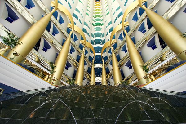 Atrium of Burj al Arab Hotel
Photographed from the lower lobby, looking up through the fountains and the large gold columns.  They love gold in the Burj al Arab!
Keywords: Burj al Arab hotel fountains atrium gold Dubai