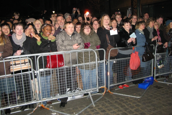 The Crowd Alongside the Red Carpet
It's always amusing when we walk down the red carpet to go into the BAFTA Film Awards.  I always think the crowd wonders, "Who are those people anyway?"  I took their picture --- they seemed pleased.
Ključne besede: BAFTA Covent Garden Crowd Fans Fence Film Awards