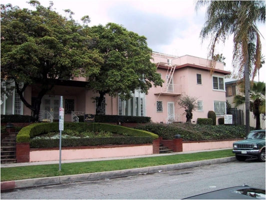The Laurels on Selma Avenue - Hollywood
When Marcia and I were first married (1971)  we lived at The Laurels at 8017 Selma Avenue in Hollywood --- at the time near Schwab's Pharmacy on Sunset Boulevard.  Our apartment was in the upper right hand corner of this California pink building.  When we drove by it in 2001 --- some 30 years later --- nothing had changed.
Keywords: 8017 Selma Avenue Hollywood Marcia Walsh Pink The Laurels