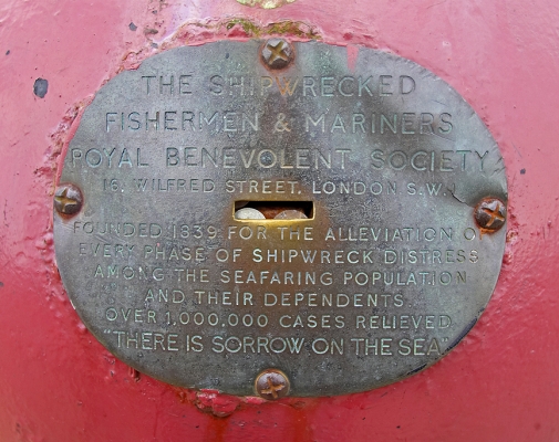 The Mine in Dartmouth
There is a big red mine on the sea front in Dartmouth with a coin slot.  The brass plaque says that all funds go to [url=http://www.shipwreckedmariners.org.uk]The Shipwrecked Fisherman & Mariners Royal Benevolent Society[/url], but the mine seemed full.  As the mine is about a meter in diameter --- if it's full of coins it must be holding a treasure trove.
Keywords: mine coins Shipwrecked Fishermen Mariners Benevolent Society Dartmouth
