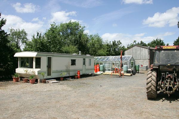 The Trailer, Greenhouse, and Barn
... and, of course, our tractor.  The farm stable yard on a hot summer afternoon.
Ključne besede: Lucies Farm stable yard trailer barn greenhouse tractor