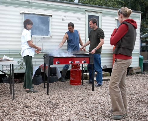 Kobe Burger Time
Having some Kobe Beef Burgers in the stable yard before the rains come in.  Marjorie with Big Grzegorz and Little Grzegorz and Julita.
Keywords: Marjorie stable yard trailer Kobe Beef burgers caravan Grzegorz Julita