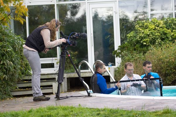 Filming from all angles
Ruth Davies filming the swimming pigs for BBC Countryfile.
Keywords: Ruth Davies Alun Grzegorz Milan swimming pool BBC Countryfile November 8 2006