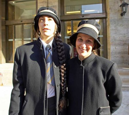 Two "Doormen" in Torino
These two ladies were, I suppose, "doormen" at a hotel in Torino.  I thought their hats were funny (as did they) so they let me take their photograph --- until the President of the Republic of Italy arrived.
Keywords: doormen Torino Italy funny hats