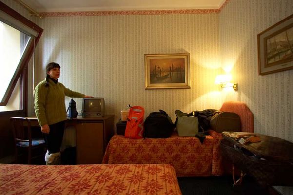 Our Room at the Hotel Plaza, Torino
We were able to find a hotel room in Torino for our last two nights at the Olympics.  Our hotel, the grandly-named Hotel Plaza, was clean and remarkably inexpensive.  But the room was also very, very "compact."
Ключові слова: Hotel Plaza Torino Turin hotel room Marjorie