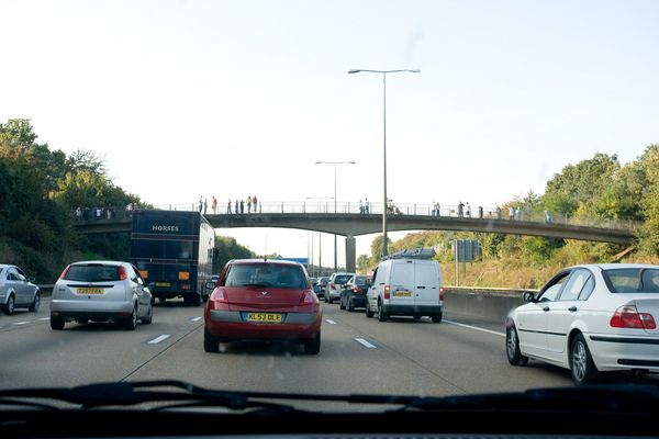 Homeward bound
Slooooooooooooow on the M25.  This was an horrific accident on the other side of the motorway - hence the gawpers on the bridge.  One car smashed on its roof and the other lodged into the barrier on the hard shoulder.  But, as usual, our side was slow for rubber neckers.
Keywords: M25