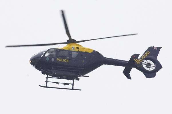 The Police Helicopter
This helicopter spent a lot of time overhead.  We didn't know if they were taking our photo (why?) so I took their photo.  We later learned they were looking for a missing person.
Keywords: police helicopter overhead