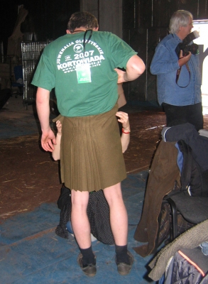 Lise Marker Adjusting Grzegorz' Kilt
Getting the costumes ready for [i]Guardian of the Veil[/i].
Keywords: Lise Marker Grzegorz Bednarski kilt adjust Guardian of the Veil