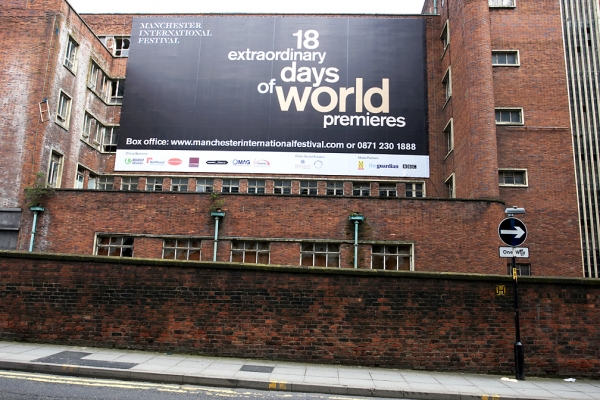 Manchester International Festival Poster
This poster was on a derelict factory across the street (and canal) from my hotel, the City Inn in Manchester.
Keywords: Manchester International Festival poster City Inn Manchester