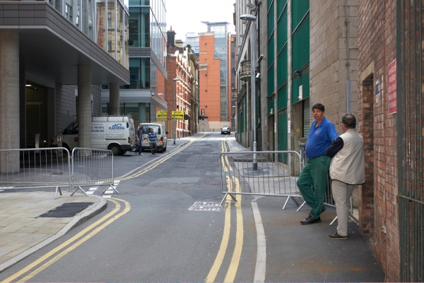 Behind the Manchester Opera House
Digby Gribble speaking with Stephen Ware, the independent veterinarian.  Whenever Ross was in the theater, Stephen was in attendance.  He also checked on Ross in the "secret location" beneath the Magistrates' Court.  This small lane is where Ross (watched by his contingent of security guards) entered and exited the Manchester Opera House.
Keywords: Stephen Ware Digby Gribble Manchester Opera House