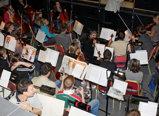 The Orchestra at the Manchester Opera House
Some reading music, some reading the tabloids.
Keywords: orchestra Manchester Opera House tabloids music