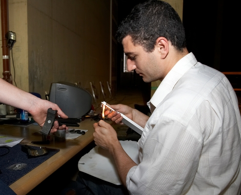 Artur Repairing The Sun Disk
Using a lighter and a few screws found in the pile of old office furniture in the corner of the warehouse area where Ross lived during his week in Manchester.
Keywords: Artur Ivanyan sun disk sun disc repair cigarette lighter