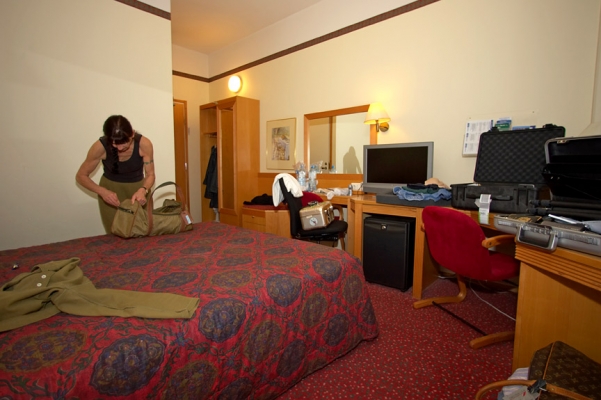 Holiday Inn Garden Court - Helsinki Airport, Finland
Because our inbound flight was late, we missed our connection to St. Petersburg in Warsaw.  This meant a side-trip to Helsinki, and we still arrived in St. Petersburg a day late.  This hotel, at the airport, was clean but basic.  Nobody to help with our luggage, so Marjorie had to put it on a chair we "borrowed" from the business centre. She pushed the luggage to our tiny room on the chair.
Keywords: Holiday Inn Helsinki Finland Marjorie roller chair