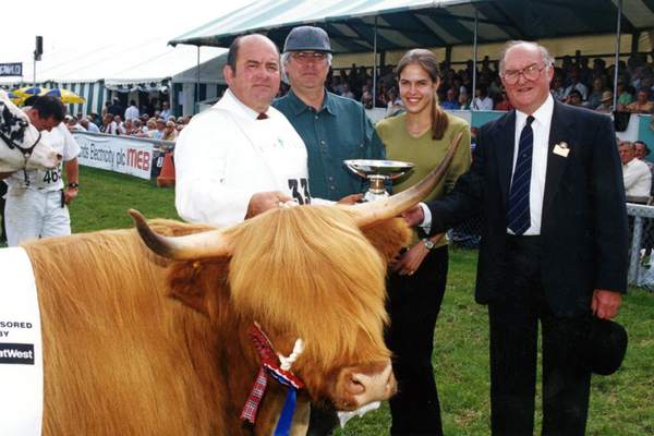 Craig and Chase Awarding the Lucies Farm Trophy
We donated a trophy, made by silversmith Martyn Pugh using Highland horn, to the Three Counties Show in Malvern.  The trophy is awarded to the best Highland cattle.  Chase and I present it for the first time.
Keywords: award cattle chase walsh craig walsh highland cattle horns three counties show trophy