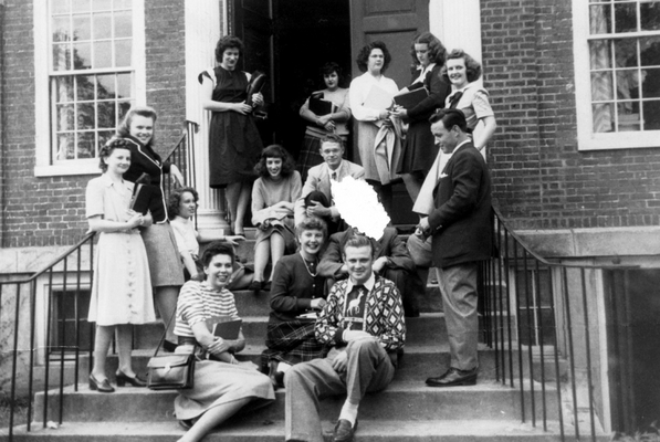 Shirley and John Walsh on the steps of Leland Powers School
My parents met at Leland Powers in Boston.  I don't know if this is a school photograph or not.  The mystery, at least to me, is what happened to the person above my father whose face has been scraped away?  My mother Shirley is on the lowest step (left) and my father John Walsh on the same step (right).  One of my mother's friends from Hawaii, Barbara (Bappy) Pickup, is sitting on the top step.  Circa 1948.
Keywords: john walsh leland powers school of theater shirley walsh