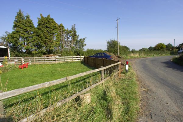 Front Garden of Woodman's Cottage and New Fence
Photographed looking south-east.  The Bransford (Colletts Green) Road is on the right.  The grassy area is the front garden of Woodman's Coggage.  The existing, side fence is in the foreground.  It meets the new fence at the traffic marker.  Photographed September 15 2006.
Keywords: Woodman's Cottage traffic marker Bransford Road Colletts Green Road Lord's Wood boundary fence