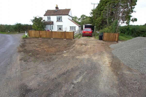The New Fence at Woodman's Cottage
Photographed on the afternoon of September 18 2006.  The excavation of some of the triangle area had started, and the load of gravel had been delivered.  The nice new fence is shown in the background.
Ключові слова: Lord's Wood Woodman's Cottage fence gravel