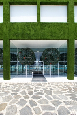 One entrance to the Adam and Eve Hotel.  The cladding is astro turf
الكلمات الإستدلالية(لتسهيل البحث): Adam Adam & Eve Hotel Antalya Belek Eve Holiday Hotel Resort Spa Turkey Vacation