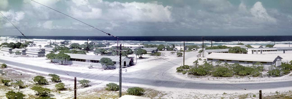 PAAVille on Wake Island -- Circa 1953
My father, Woody Walsh, took a a series of photos from (I would guess) the tower at the airport of the "skyline" of PAAVille on Wake Island.  This panorama is two of the slides stitched together with modern software.
Ключови думи: Atoll Atolls Island Islands Ocean Oceans PAA PAAVille Pacific Ocean Pan American PanAm Wake Island