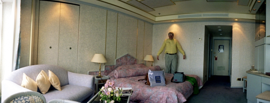 Standing In Our Cabin on the QE2
Marjorie was seasick during most of the crossing of the North Atlantic, so she spent a lot of time in our cabin.  During the last day or so of our trip the seas started to calm, so Marjorie was able to see some of the ship.
Keywords: Cruise Cruises Luxury Liner Luxury Liners New York City New York Harbor New York Harbour Panorama Panoramic QE2 Queen Elizabeth II Seasick Arrival Cabin Craig Widelux Cruise Liner Cruise Liners Cruise Ship Cruise Ships