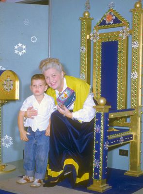 Me and a Scary Lady on a Throne
I have no idea who this lady is, why she's sitting on a throne, and why I look so unhappy.  The photo has a Christmas look --- perhaps sending letters to Santa?  But the lady is a tad scary.
Anahtar kelimeler: scary lady Santa Craig Christmas throne