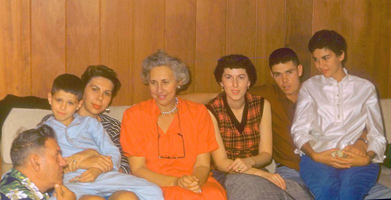 Christmas at 1080 Makaiwa Street
This looks like one of those self-timer photographs, were Baba set the camera and then ran in (almost) into the frame.  Baba (on his knees), me, my mother, Nana, Bappy, Neil Moore, and my aunt Birdie.  Photographed at 1080 Makaiwa Street, circa 1956.
Keywords: Makaiwa Street Nana Craig Birdie Bappy Neil Moore Birdie Baba