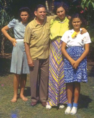 Happy Family?
This is quite an old photograph -- pre WW2.  My mother, on the left, looks positively wicked.  Baba, Nana, and Birdie --- with a bright yellow flower.
Keywords: Shirley Nana Baba Birdie