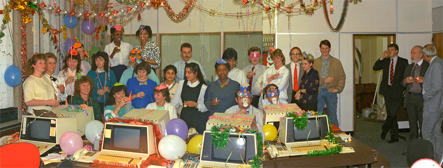 Transax Christmas Photo - 1987
We'd just moved into Tricorn House in Edgbaston.  We still had the funny old Warwick Systems VDU's.  We decorated the offices on the 9th floor with the tacky Christmas tinsel, and took this picture of exhausted authorisers (in fact, pretty much everybody) on Christmas Eve 1987.
Keywords: Transax Christmas Tricorn House authorisers cheque guarantee