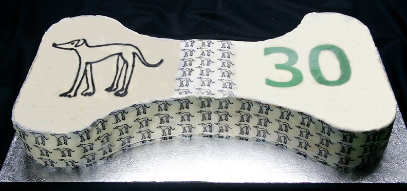 Retired Greyhound Trust Anniversary Cake
The PR firm for [url=http://www.retiredgreyhounds.co.uk/]The Retired Greyhound Trust[/url] contacted us. They wanted a double-sized cake for a 30th birthday celebration. We explained that this would be a prototype, but they insisted. It was for a celebrity (we were told it would be Uri Geller) to cut at a PR function. This descended into farce, and they got their cake elsewhere. Here's the finished product. Now what to do with it....? 
Ключові слова: Retired Greyhound Trust anniversary cake dog cake bone cake bone-shaped PR firm Uri Geller