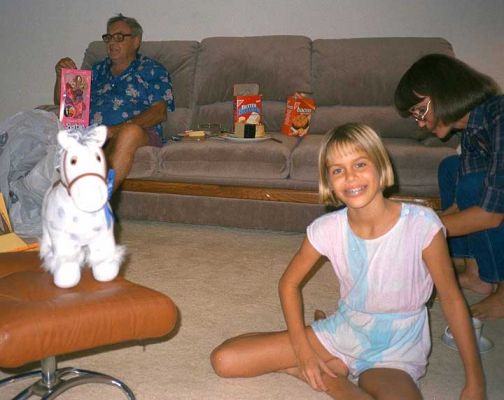 Grandfather, Chase, and Marcia - Christmas 1985
Funny, although this picture is almost 20 years old, I can still see Grandfather sitting on that couch, eating cheese and crackers.  We still have the leather chair (and the ottoman with Chase's Christmas pony).  We moved the couch to England, and sat on it in The Limes.  Chase sure looks happy!
Anahtar kelimeler: Chase Marcia Grandfather couch Honolulu Tower Christmas 1985 pony toy