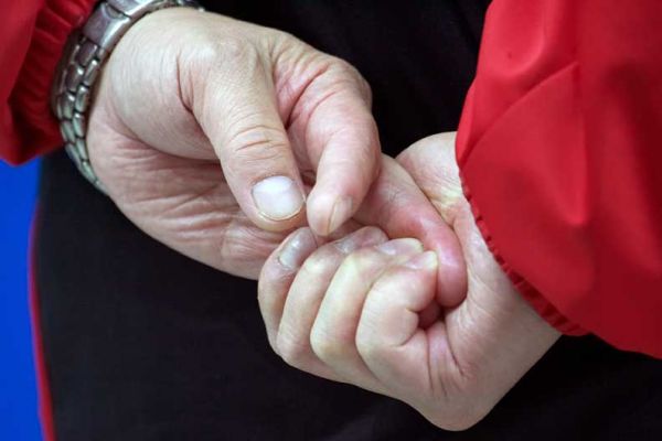 Japanese Speed Skating Coach
These are his hands as the skaters performed at the 500m Men's Speed Skating Championship, Oval Lingotto, February 13 2006.  I was surprised at how hard he was squeezing his finger.  Ouch!
Keywords: hands Japanese speed skating coach squeeze fingers Olympics Oval Lingotto
