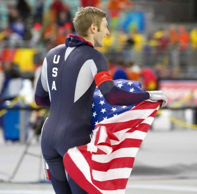 Joey Cheek Takes His Victory Lap
Men's 500m Speed Skating, Oval Lingotto, February 13 2006
Keywords: men's speed skating Joey Cheek Oval Lingotto Olympics American flag