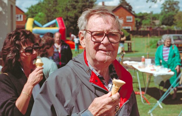 Grandfather (John "Woody" Walsh) Having An Ice Cream
Grandfather had a stroke in 1987.  This photograph was taken at an outdoor fair at The Lawns nursing home in Kempsey, where he was living at the time.  It was a sunny day, and we all had ice cream cones.  We entered Kea, our bull terrier, in the waggy tail contest.
Mots-clés: Grandfather John Woody Walsh ice cream cone Kepmsey The Lawns stroke