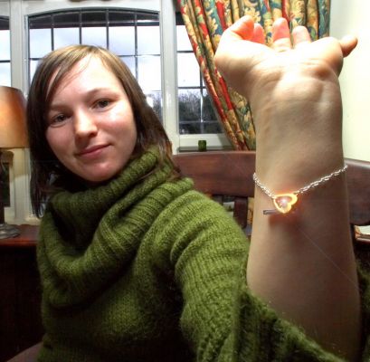 Emilia on Her Last Day at Lucies Farm
Trying on her new bracelet --- her going-away present --- at her farewell lunch at The Fox in Bransford.
Ключови думи: Emilia bracelet farewell lunch