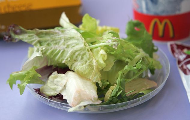 McDonald's Fresh Garden Salad
Photographed on our table at the McDonald's on Hylton Road, Worcester.  This is the second salad: Marjorie couldn't eat the first one.  The helpful staff said this one had been "freshly made."  It appears to be made from old ingredients.  It certainly doesn't look like the salad pictured on their website, or at the counter.
Keywords: McDonalds garden salad Hylton Road Worcester