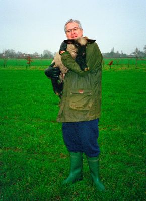 Craig and a Hampshire Down Lamb
We don't raise sheep any more --- this is a photo from the "archives" of me holding a Hampshire Down lamb.
Keywords: Hampshire Down lamb Craig Barbour wellies