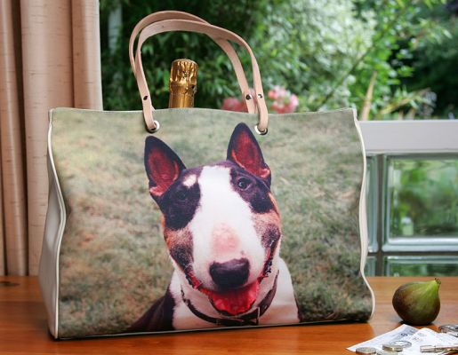 Tapa on Leather Handbag
We've loved taking photos of our doggie guests, and folks have asked us for copies of the photographs.  We have taken our photos of our own dogs (here's a photo of Tapa) and have put them on canvas.  This is a canvas and leather handbag:  it has Tapa on one side, and Kiko on the other.  Now available from Lucies Farm using any of the photographs on this website.
Ключові слова: Tapa handbag canvas leather photos Lucies Farm dog hotel dog boarding dog kennel