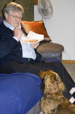 Bonnie waiting patiently for a taste
Bonnie looks on with longing for a taste of what John is eating
