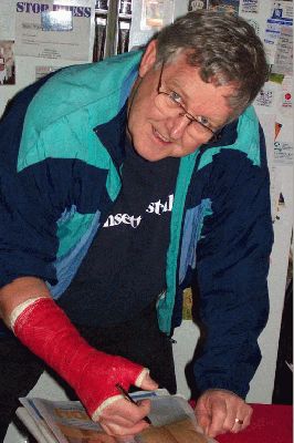 I'll get the hang of using a pen eventually
John trying to sign something with his plaster on, not the easiest but he did it. Do you like the red cast?, he had a choice of red, black or blue, so what other colour would an art teacher choose?
