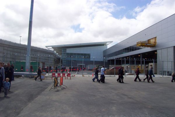 Visit to New Airport
Waiting for the bus to take us into town after our visit to the new airport building, this is taken looking back at the building. Oct 9th 2005
