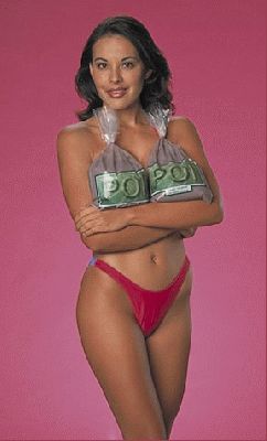 The Poi Girl
We got the bright idea (?) that it would be clever to create a "Poiboy" parody of "Playboy."  Of course, to do so we needed a Playmate.  We asked Camera Hawaii to do a G-rated version, and this is what they produced.  You see less in this photograph than you see on any day at the beach, but this still didn't stop some people from complaining.
Palabras Clave: Playboy Poiboy poi